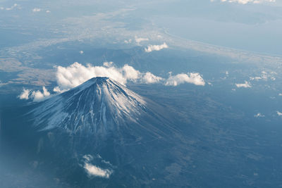 Aerial view of volcanic landscape against sky