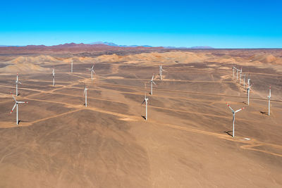 Aerial view of an eolic park in the atacama desert outside the city of calama, chile