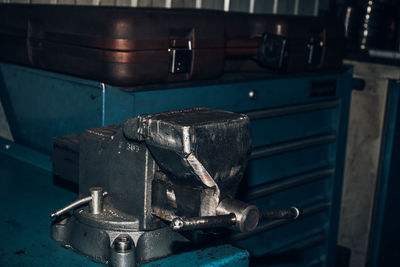 Locksmith vise in the repair shop. in dark colors.