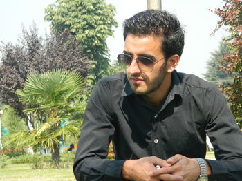 Portrait of young man in sunglasses