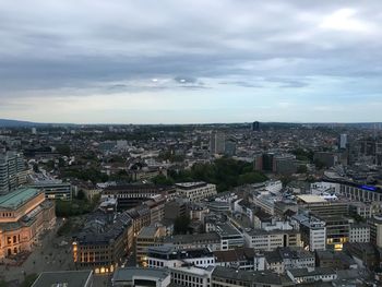 Aerial view of cityscape against sky