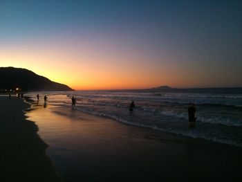Scenic view of sea at sunset