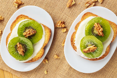 High angle view of fruits in plate on table