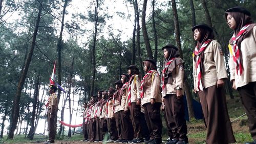 Panoramic shot of people in forest