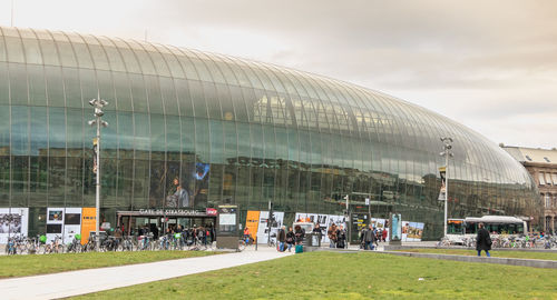 Group of people in front of modern building