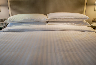 Tilt image of empty bed at home