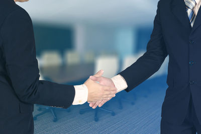 Cropped image of hand holding ice cream cone