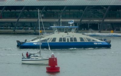 Boats moored at harbor