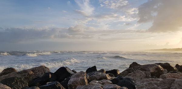 Scenic view of sea against sky during sunset