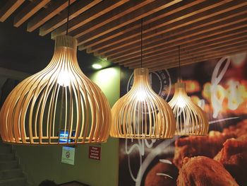 Close-up of illuminated lanterns for sale at market stall