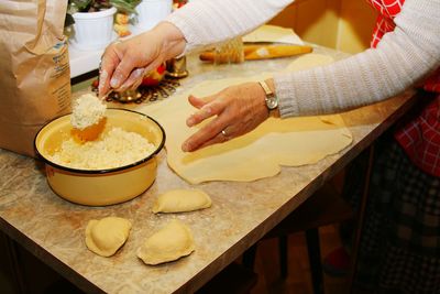 High angle view of woman preparing food