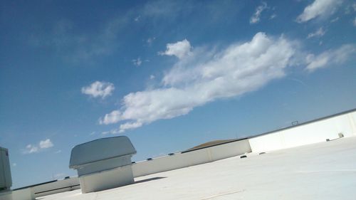 Low angle view of built structure against blue sky