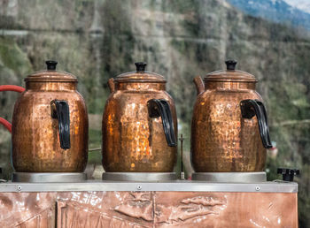 Close-up of old glass jar on table