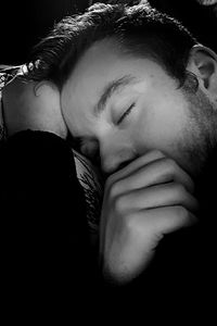 Close-up portrait of a man sleeping