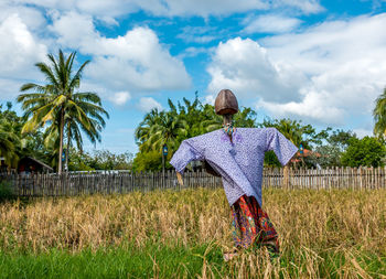 View of scarecrow in field