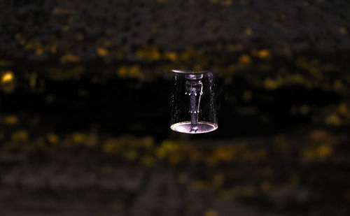 Close-up of water drops on metal