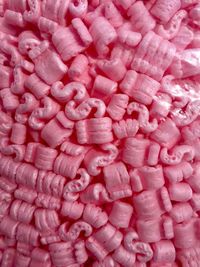 Full frame shot of pink slices