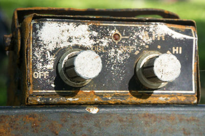 Close-up of rusty radio