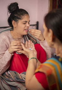 Young woman using mobile phone