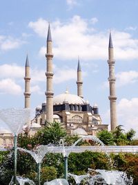 View of mosque against sky in city