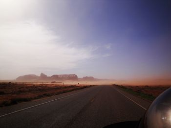 Highway against sky during sunset