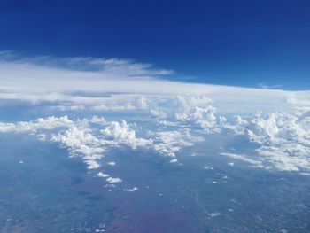 Aerial view of clouds over sea against sky