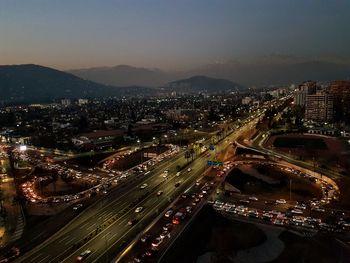 High angle view of illuminated cityscape at night