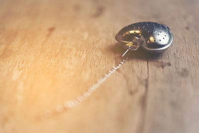 High angle view of wedding rings on table