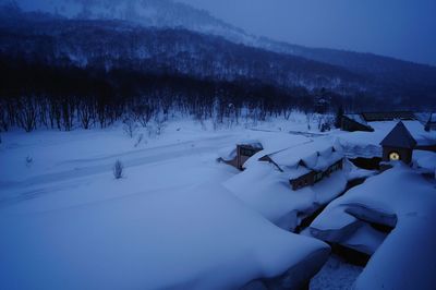 Scenic view of snow covered field