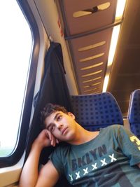 Boy sitting in bus