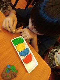 High angle view of baby boy on table