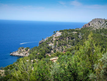 Scenic view of sea against blue sky