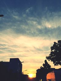 Silhouette of building at sunset