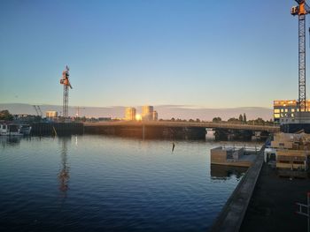Scenic view of sea against clear sky during sunset