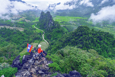 Top view of beautiful forest landscape of mist at pha namxay mountains vang vieng, laos