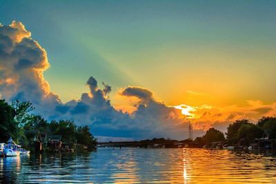 Scenic view of sea against sky at sunset