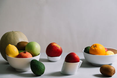 Close-up of fruits in bowl on table