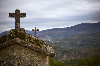 Cross against sky