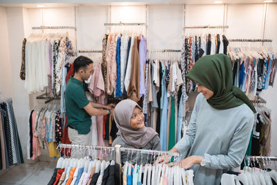 Mother and daughter shopping in mall