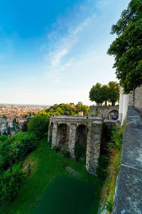 View of bridge over river in city
