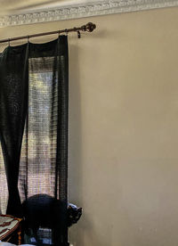 House hanging on wall at home