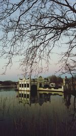 View of built structure by lake