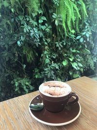 Coffee cup on table