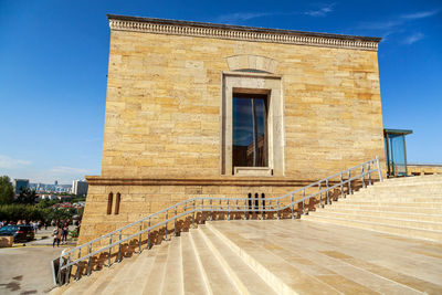 Exterior of historic building against sky