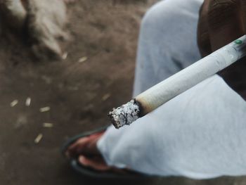 Close-up of cigarette smoking outdoors