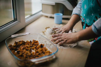 Close-up of woman preparing food