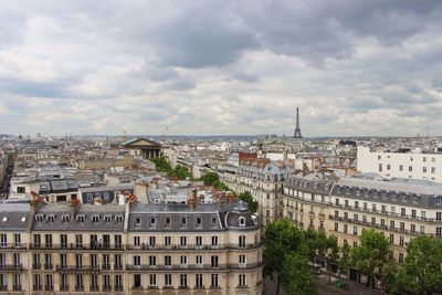 High angle view of buildings in city against sky