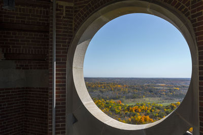 Landscape seen through window of holy hill national shrine of mary