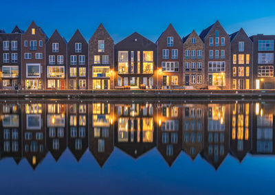 Reflection of buildings in water