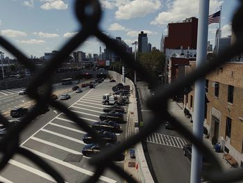 High angle view of street amidst buildings in city